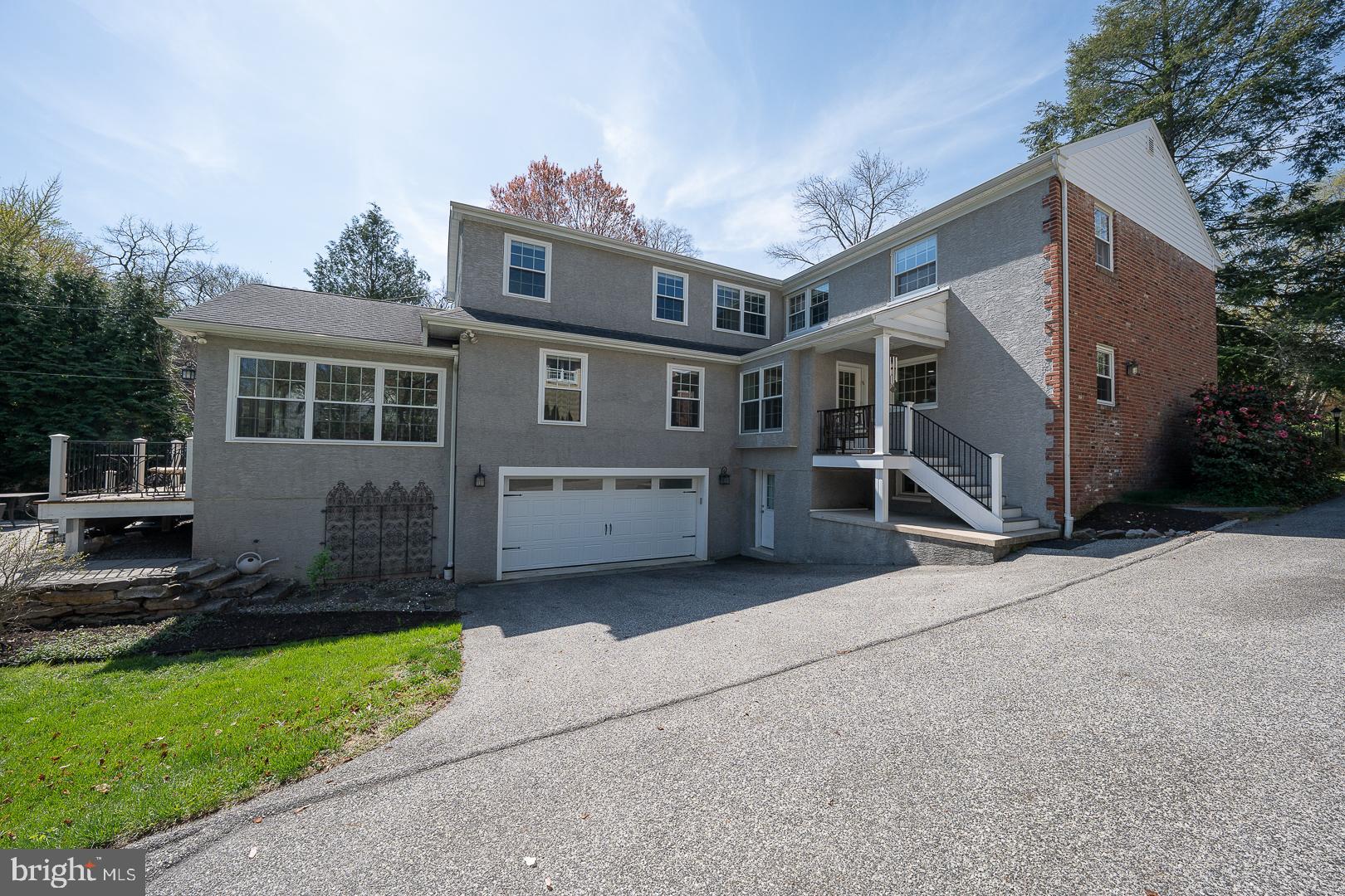 421 Wister Road Wynnewood, PA 19096 - Photo 49 of 53 front view of a house with a yard