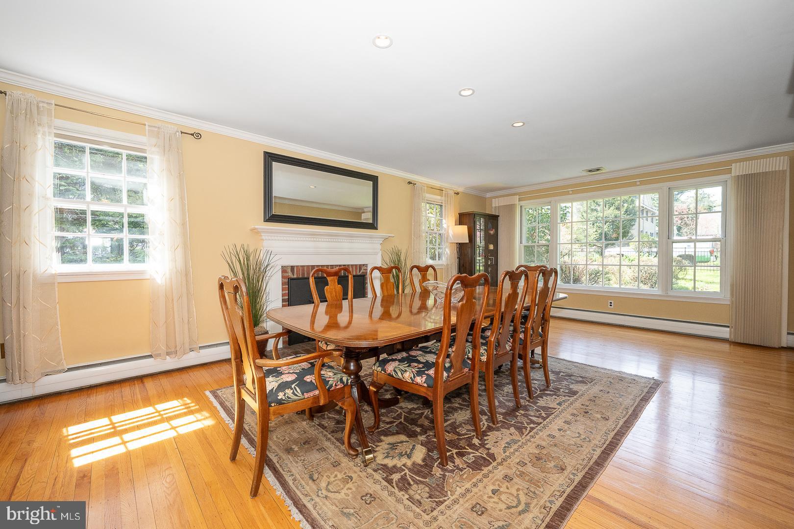 421 Wister Road Wynnewood, PA 19096 - Photo 8 of 53 a dining room with furniture a rug and wooden floor
