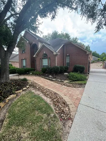 a view of a room with wooden floor and window