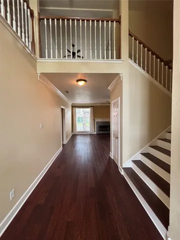 a kitchen with stainless steel appliances granite countertop a refrigerator a microwave a sink and cabinets