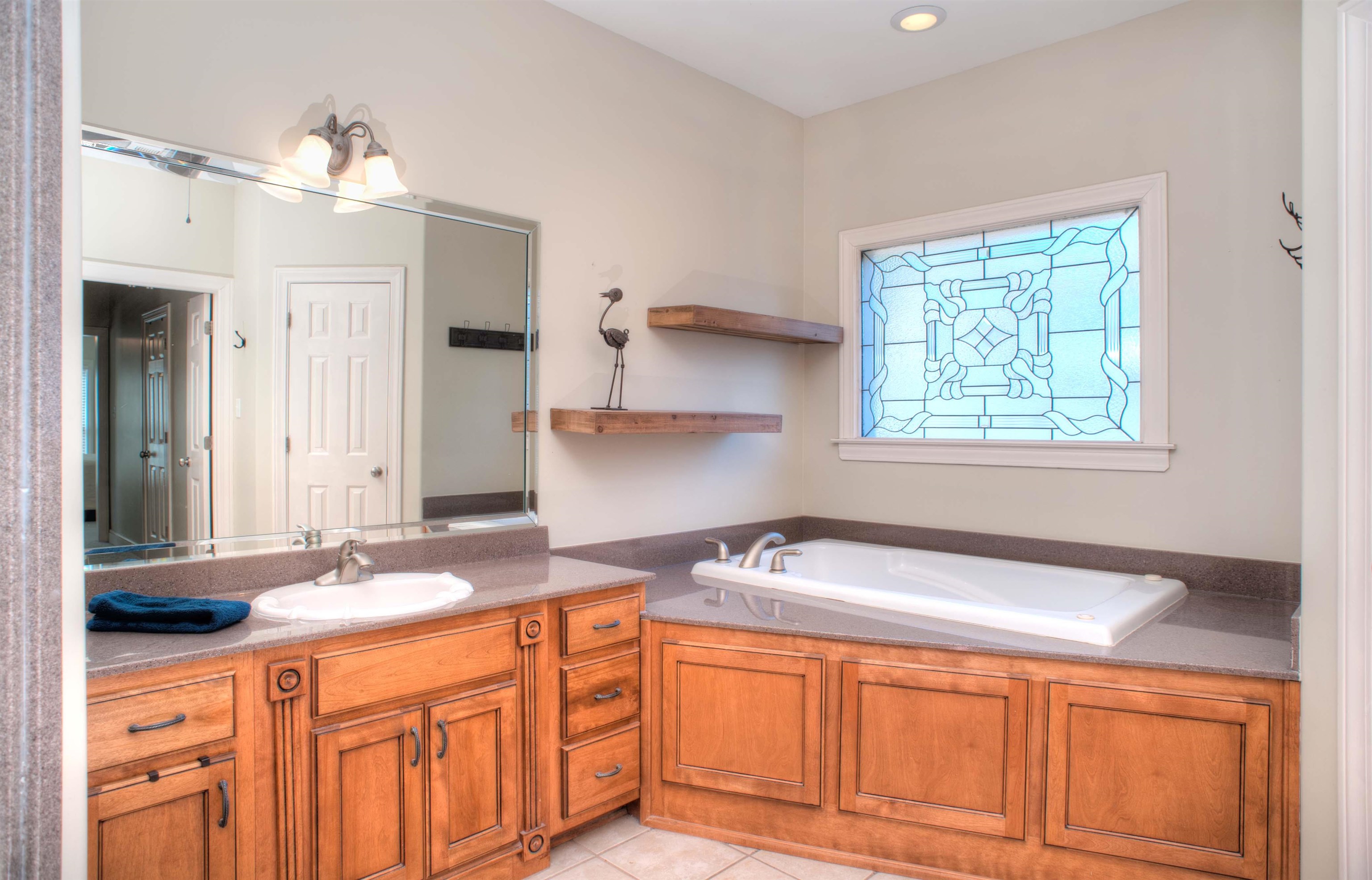 495 Tribal Woods Road Collierville, TN 38017 - Photo 12 of 22 Luxury Primary Bath has 2 Separate His/Hers Vanities, Whirlpool Tub and Separate Shower