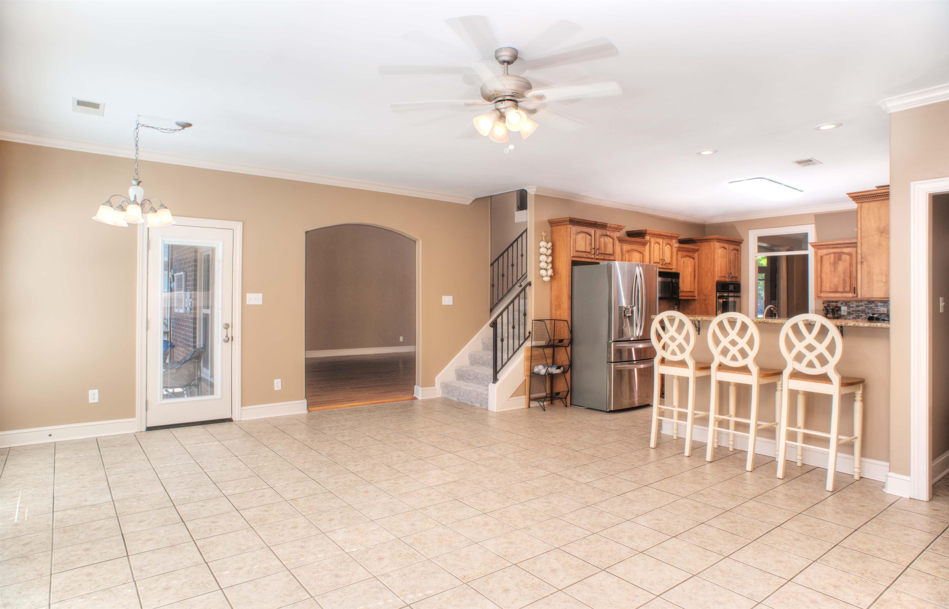 495 Tribal Woods Road Collierville, TN 38017 - Photo 8 of 22 Large and Open Breakfast Area in Kitchen area and adjacent to the Hearth Room, plus convenient Rear Staircase