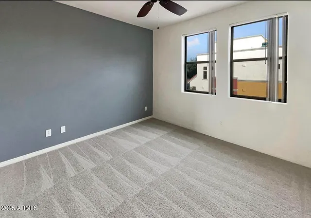 an empty room with closet area