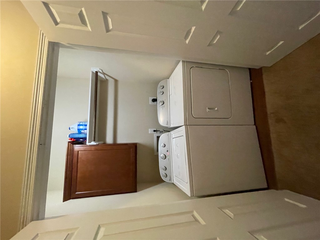 1198 Jones-Butler Road, Unit 2706 College Station, TX 77840 - Photo 8 of 17 a utility room with dryer and washer