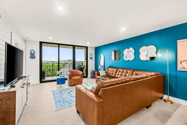 a view of a lake with houses in the back