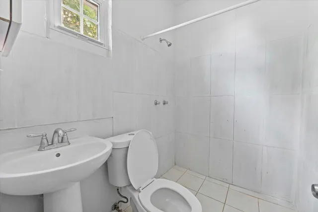 a bathroom with a sink and a toilet