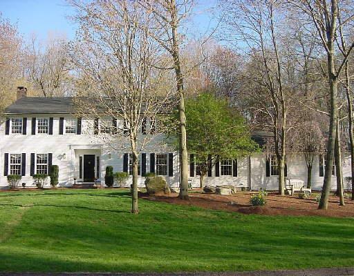 69 Crosswicks Ridge Road Wilton, CT 06897 - Photo 1 of 1 a house view with sitting space and garden