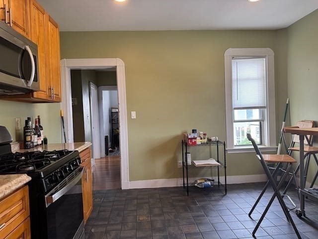 43 Sydney Street, Unit 2 Boston, MA 02125 - Photo 14 of 28 a kitchen with a table and chairs in it