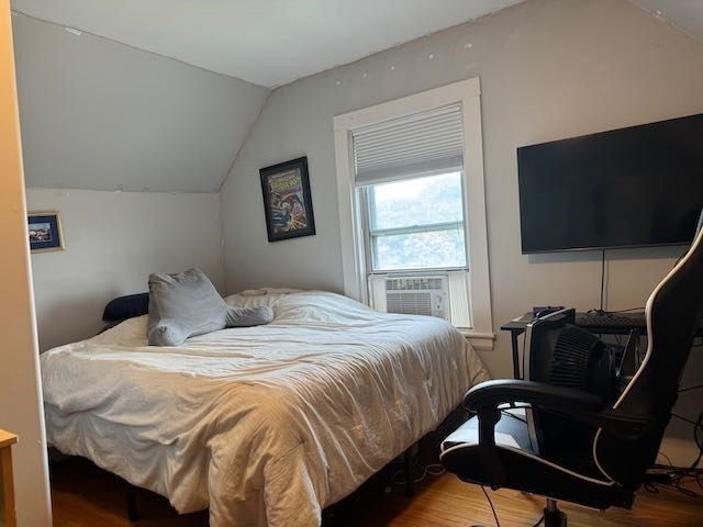 43 Sydney Street, Unit 2 Boston, MA 02125 - Photo 21 of 28 a bedroom with a bed and a flat screen tv