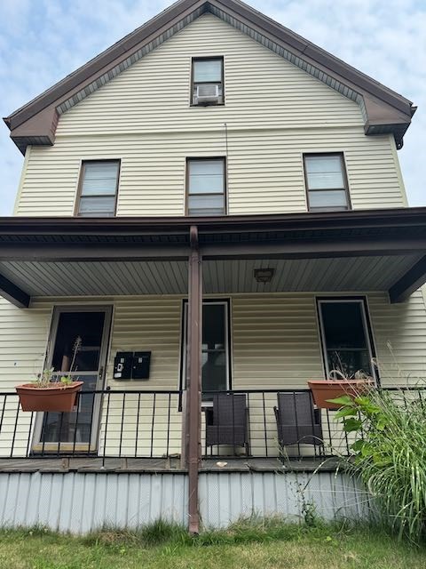43 Sydney Street, Unit 2 Boston, MA 02125 - Photo 4 of 28 a view of a house with a small yard and wooden fence