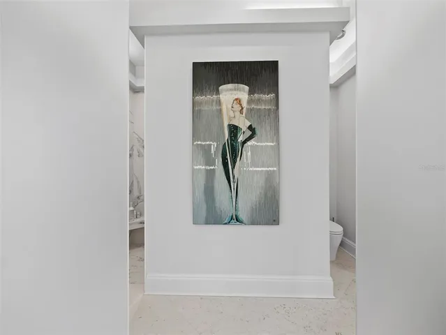 a spacious bathroom with a double vanity sink a mirror a bathtub and next to a window