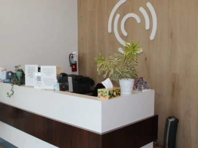 a room with a table and chairs