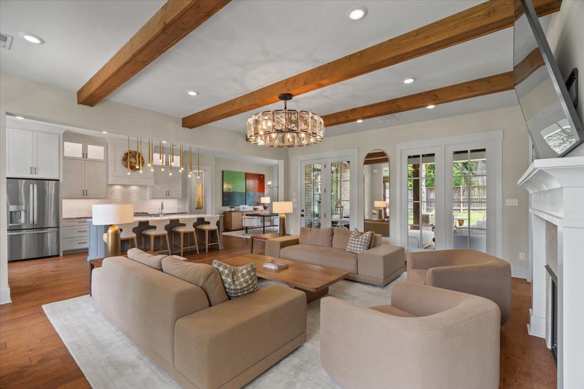 240 Burrows Road Collierville, TN 38017 - Photo 9 of 37 Open-concept living space featuring exposed wood ceiling beams and recessed lighting
