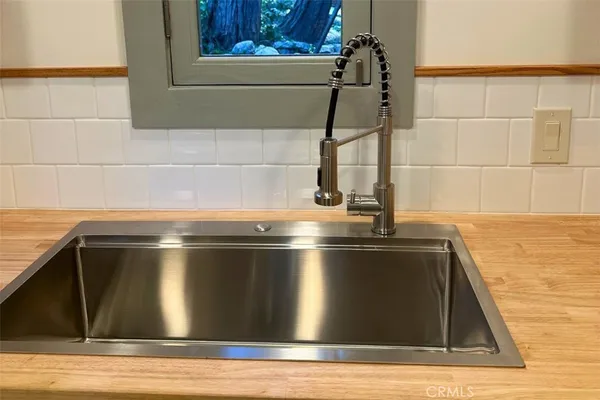 a close view of sink and stove
