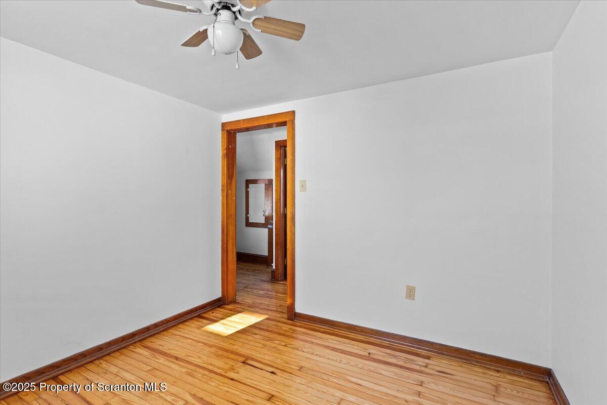 131 Stephenson Street Duryea, PA 18642 - Photo 17 of 28 a view of an empty room and chandelier fan