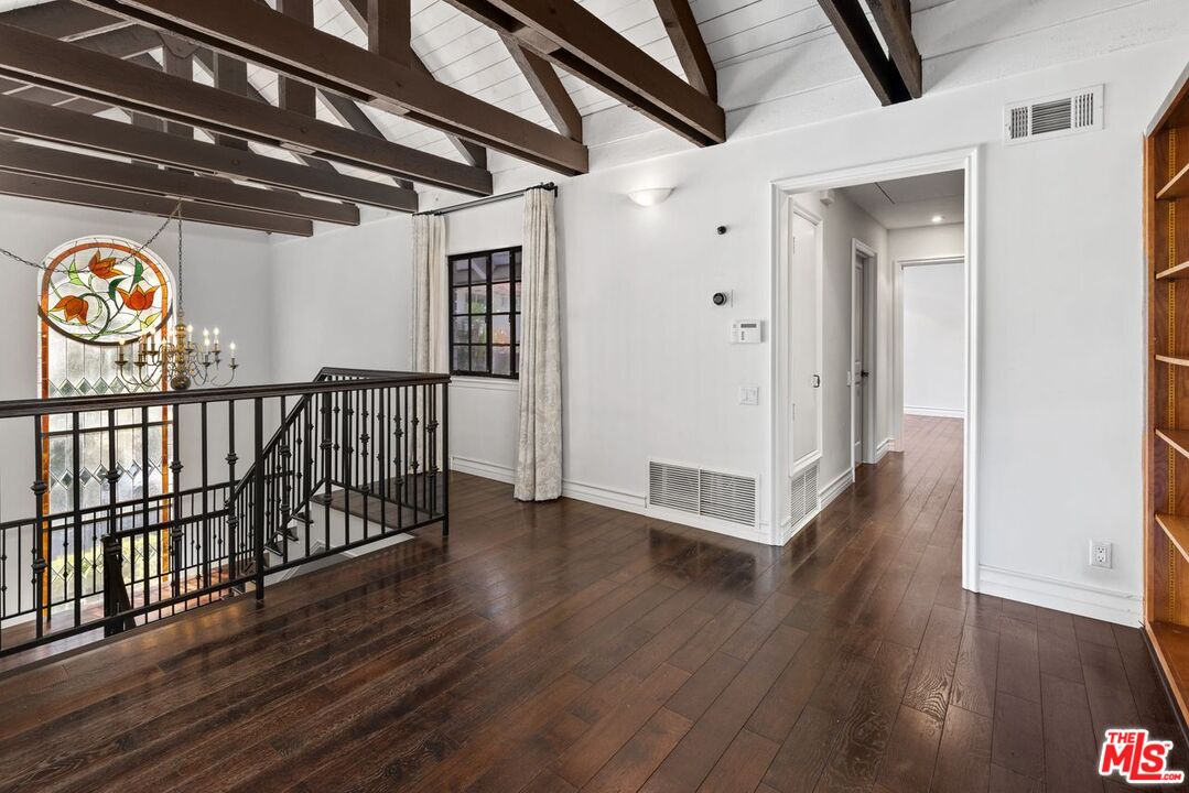 1060 Chantilly Road Los Angeles, CA 90077 - Photo 28 of 40 a view of hallway with wooden floor