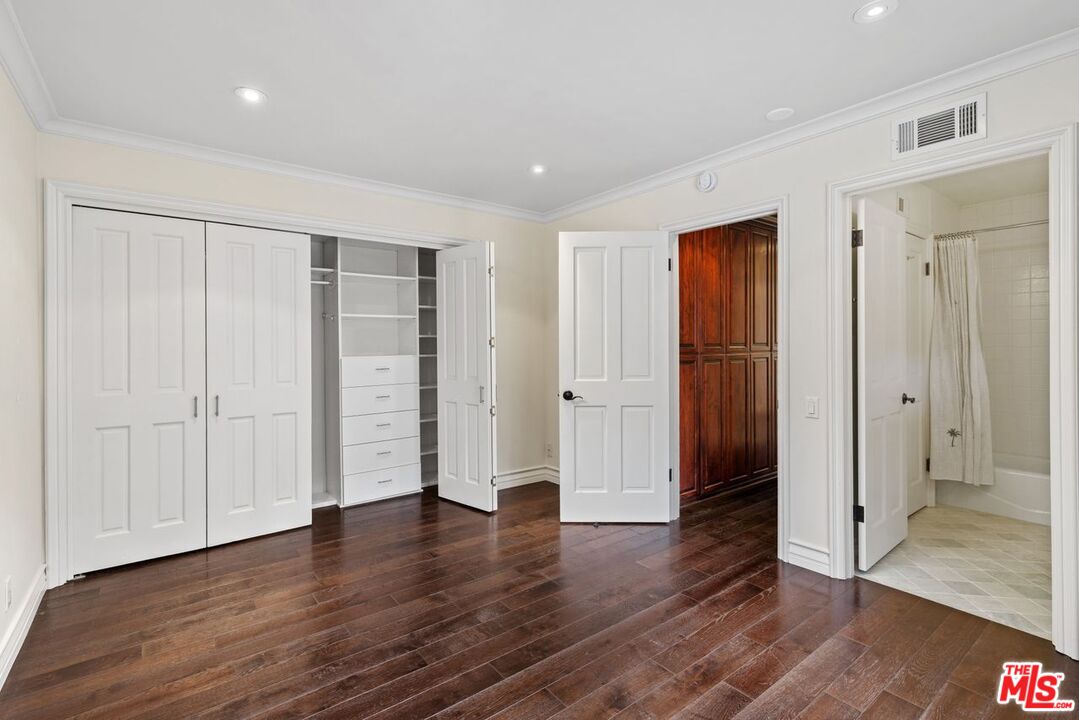 1060 Chantilly Road Los Angeles, CA 90077 - Photo 34 of 40 a view of empty room with wooden floor