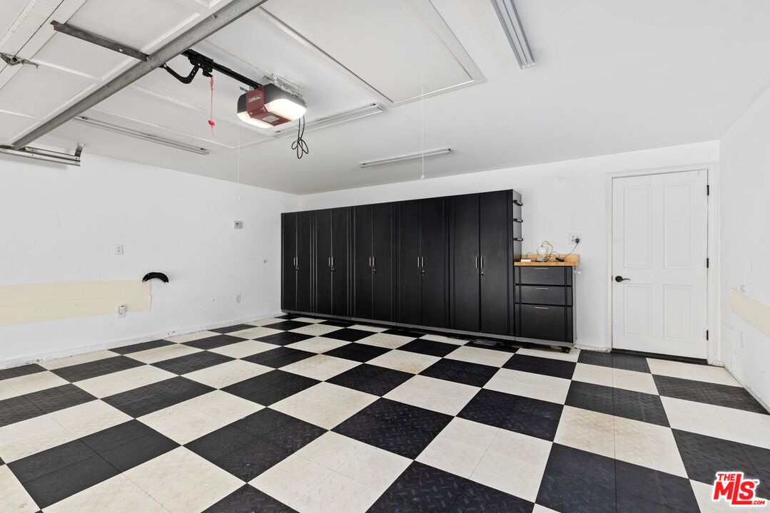 1060 Chantilly Road Los Angeles, CA 90077 - Photo 36 of 40 a black and white checkered floor with a black white checkered floor