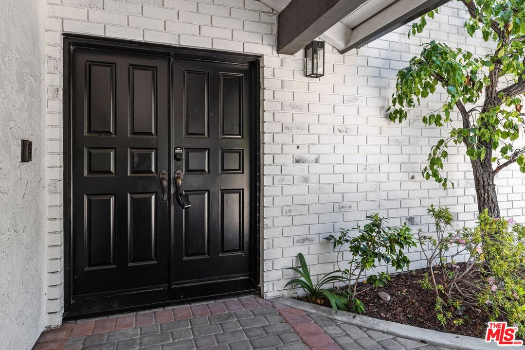 1060 Chantilly Road Los Angeles, CA 90077 - Photo 5 of 40 a view of a door of the house
