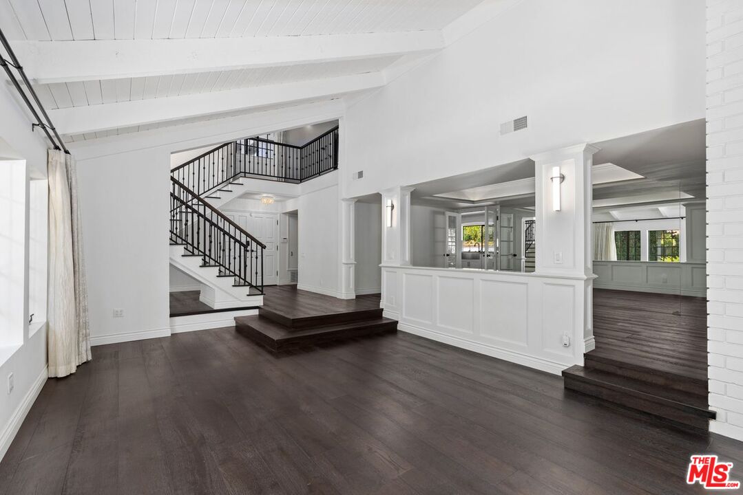 1060 Chantilly Road Los Angeles, CA 90077 - Photo 8 of 40 a view of an entryway with wooden floor