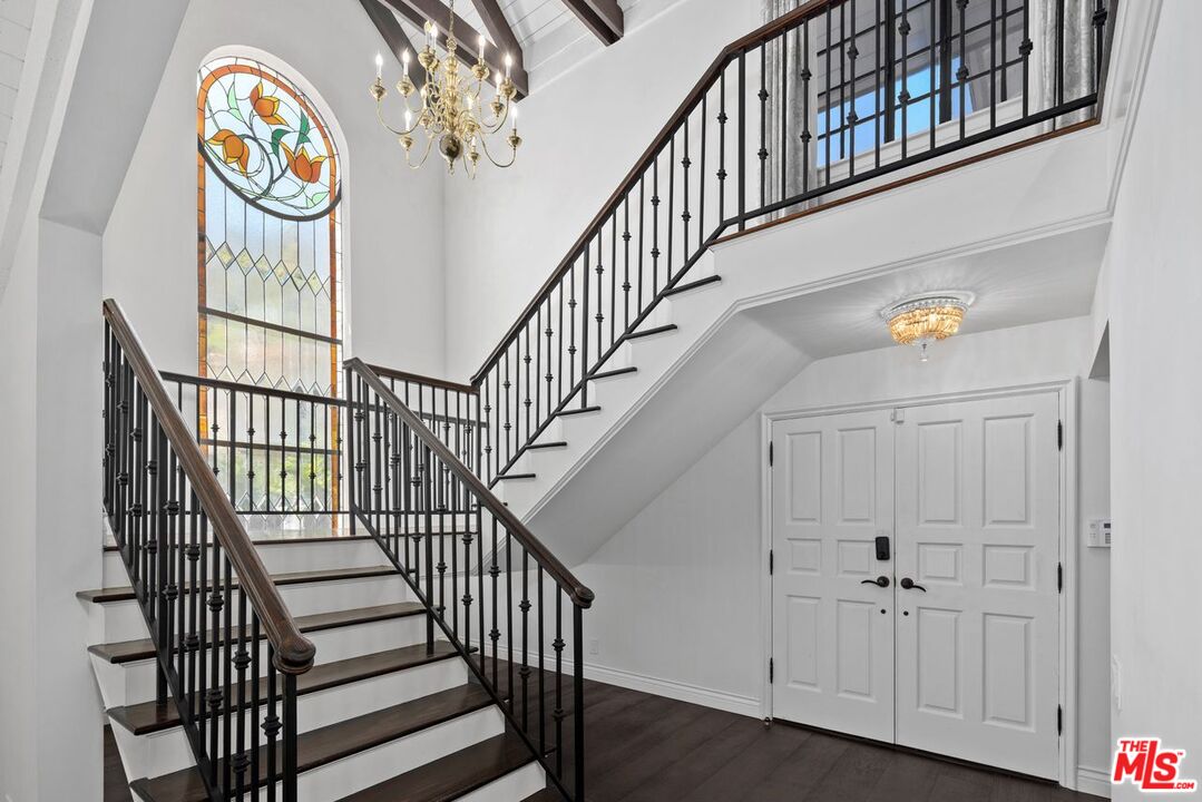 1060 Chantilly Road Los Angeles, CA 90077 - Photo 9 of 40 a view of entryway with wooden floor