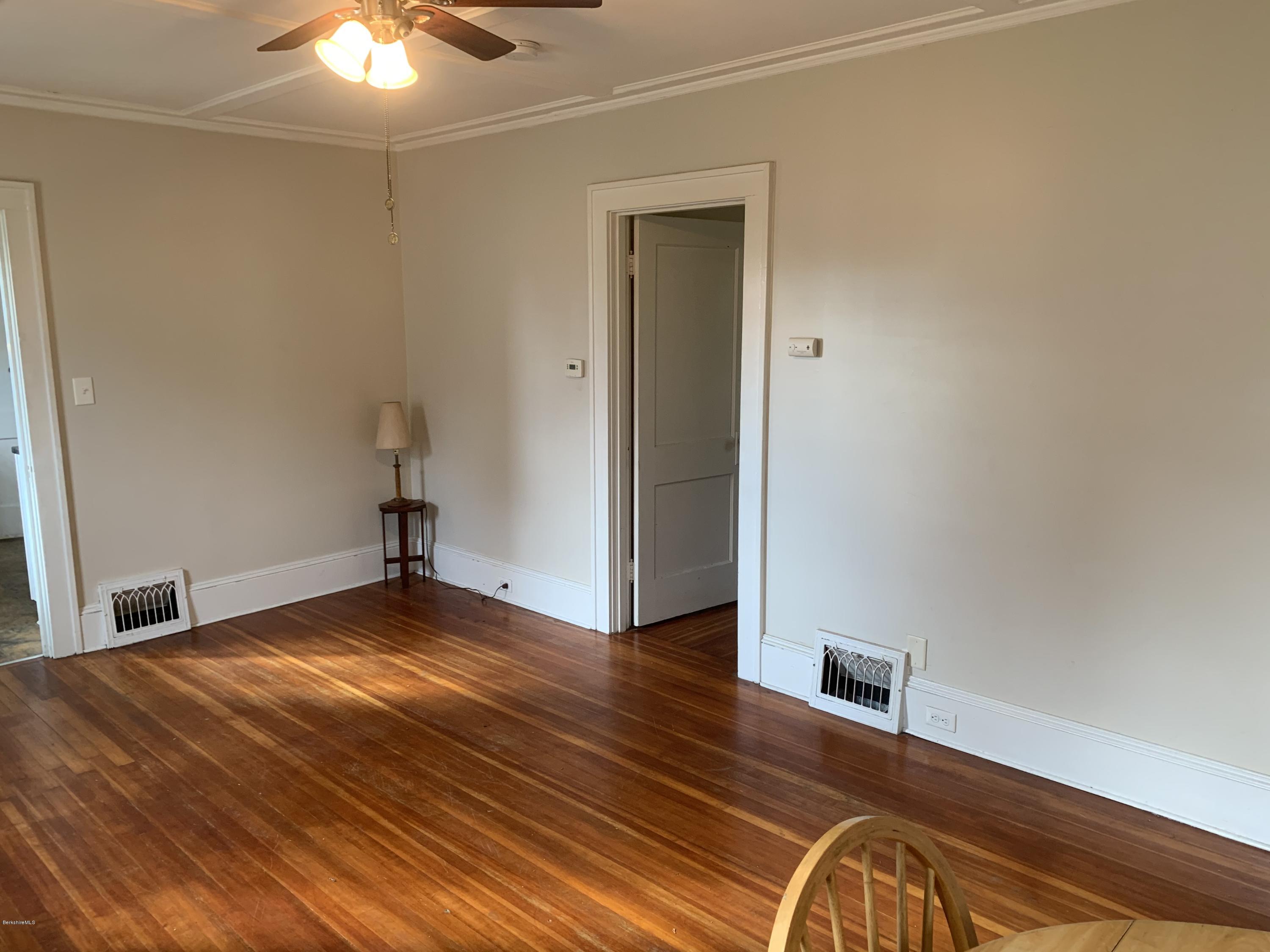 163 Cheshire Road Pittsfield, MA 01201 - Photo 19 of 45 Living room bedroom door