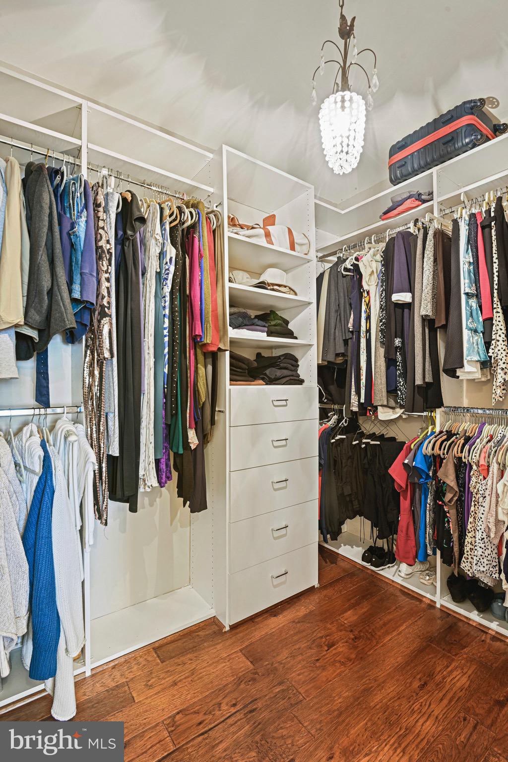 1701 Lake Shore Crest Drive, Unit 24 Reston, VA 20190 - Photo 17 of 43 a view of walk in closet with clothes
