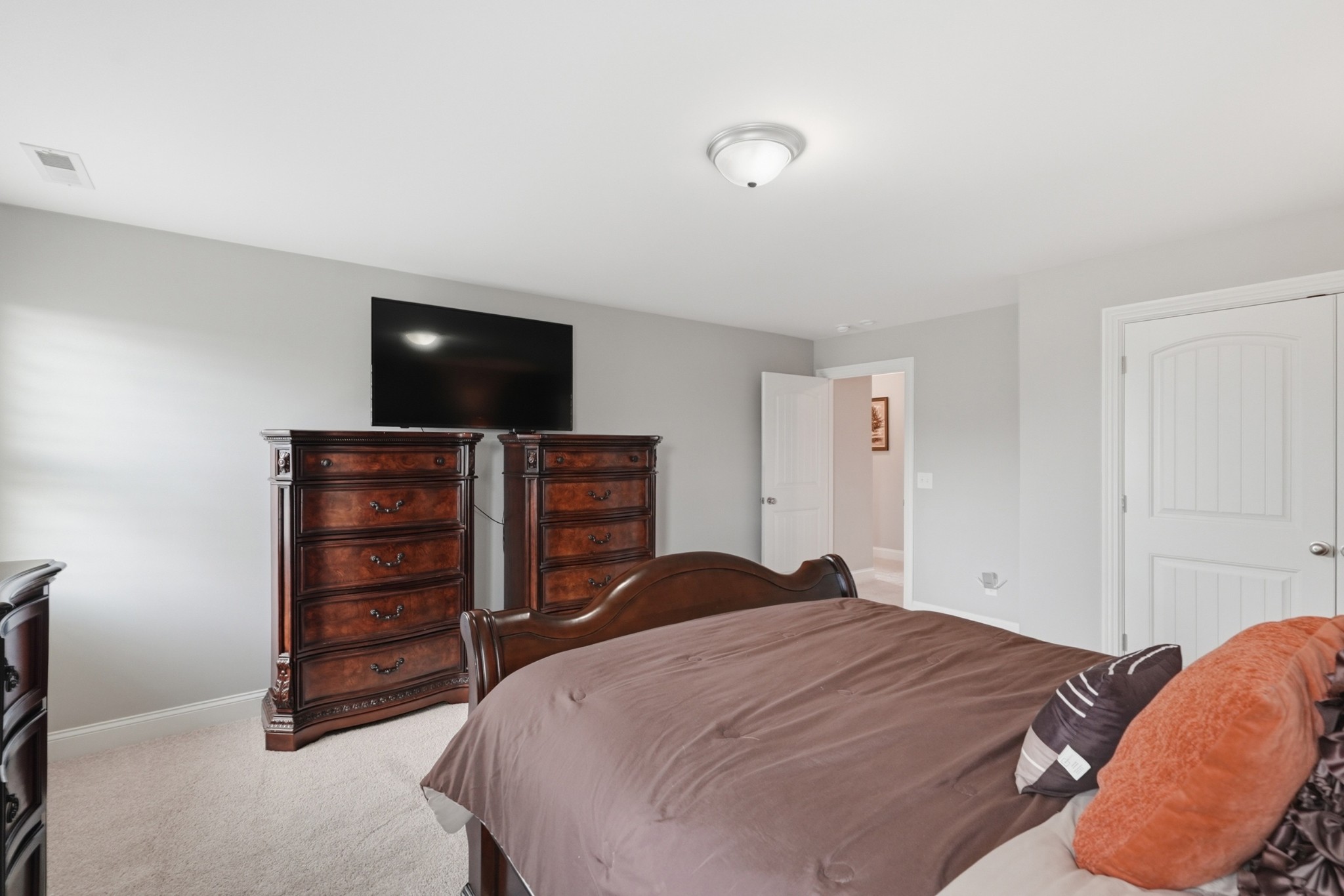 6000 Wallaby Court Spring Hill, TN 37174 - Photo 35 of 57 a bedroom with a bed and a television