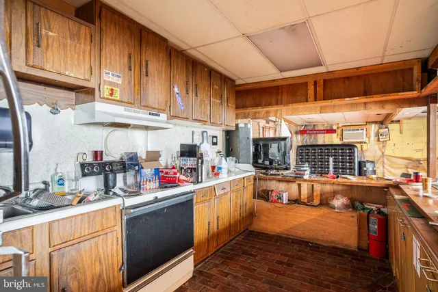a view of a chairs and table in a room