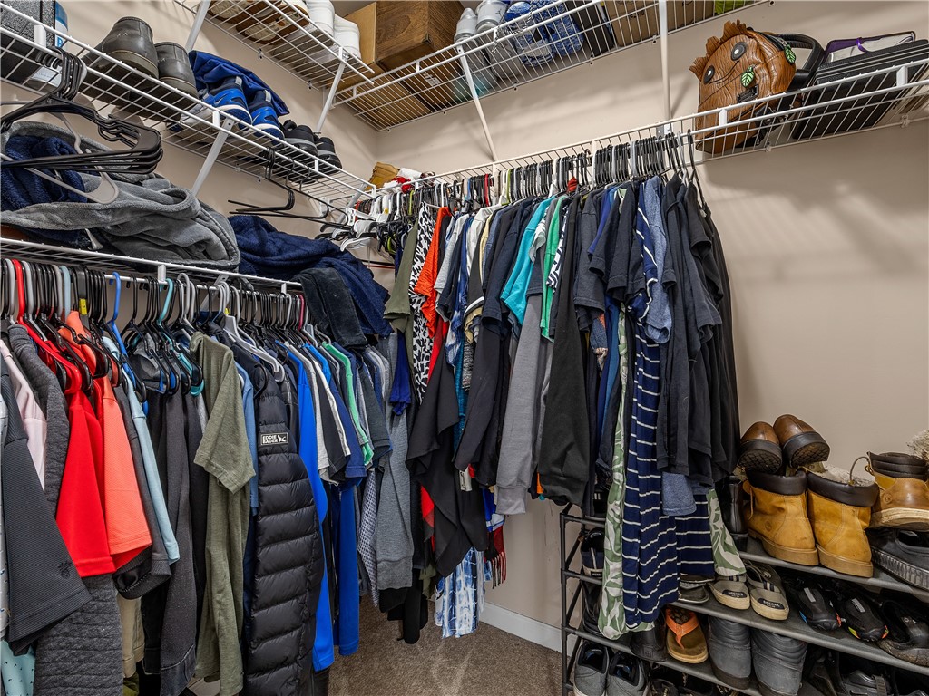 2520 Linmar Circle Anderson, SC 29621 - Photo 27 of 50 Well-appointed walk-in closet with ample wire shelving and hanging rods for versatile storage.