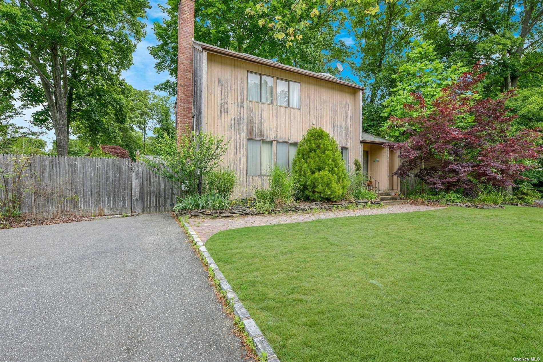 183 King Road Rocky Point, NY 11778 - Photo 1 of 1 a view of a house with backyard and garden