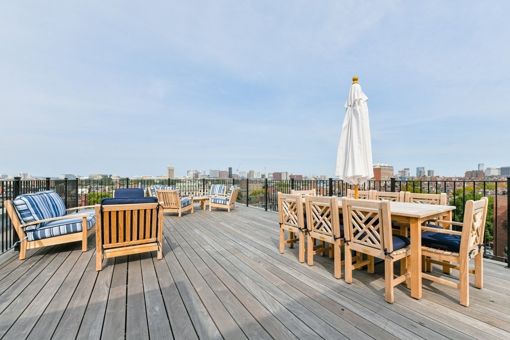 311 Commonwealth Avenue, Unit 41 Boston, MA 02115 - Photo 22 of 31 a view of a roof deck with patio