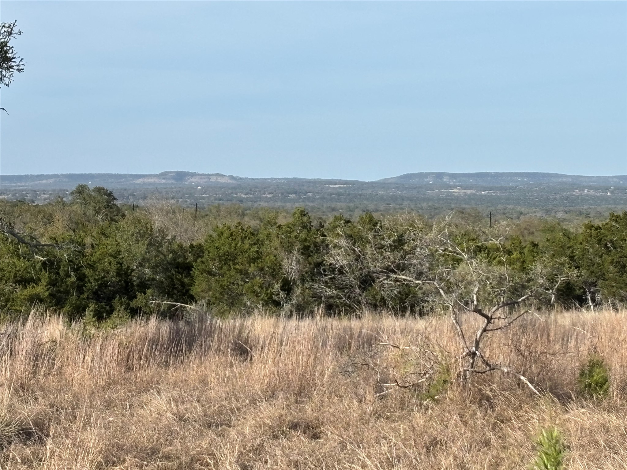 768 Tiswin Trail Blanco, TX 78606 - Photo 2 of 14 a view of lake with mountain