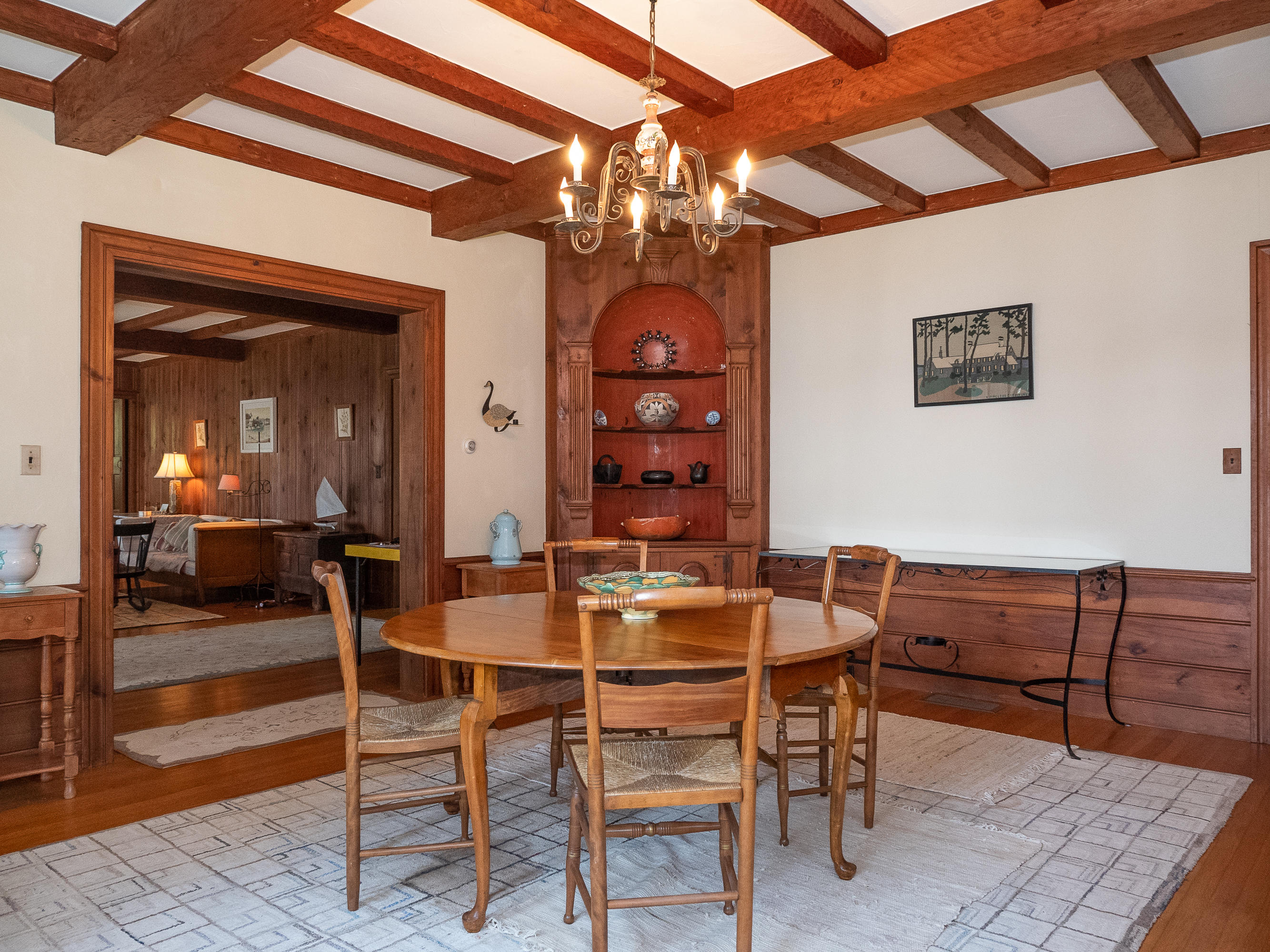 671 Old Post Road Cotuit, MA 02635 - Photo 13 of 36 a dining room with furniture and chandelier