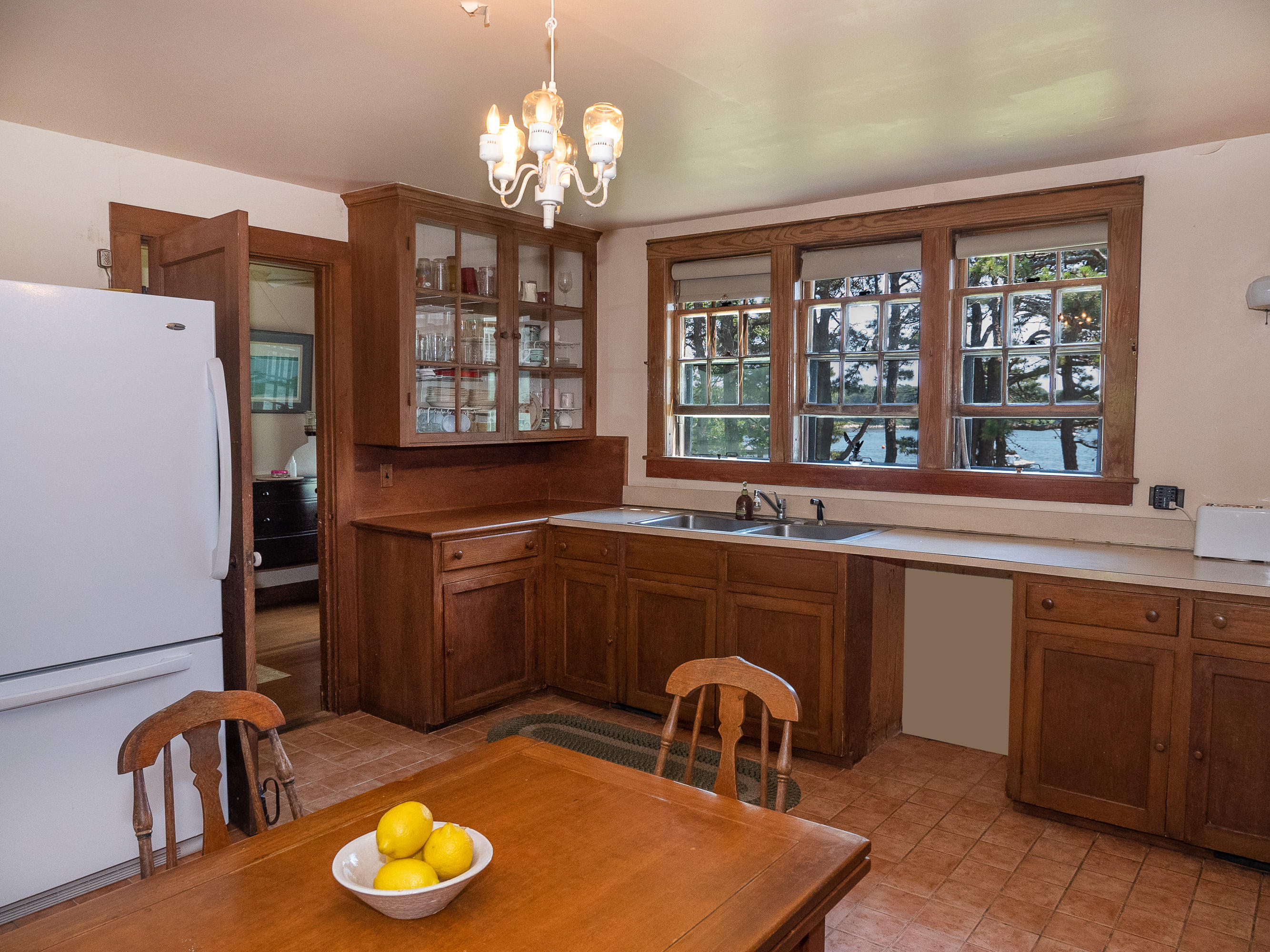 671 Old Post Road Cotuit, MA 02635 - Photo 16 of 36 a kitchen with sink and view of living room