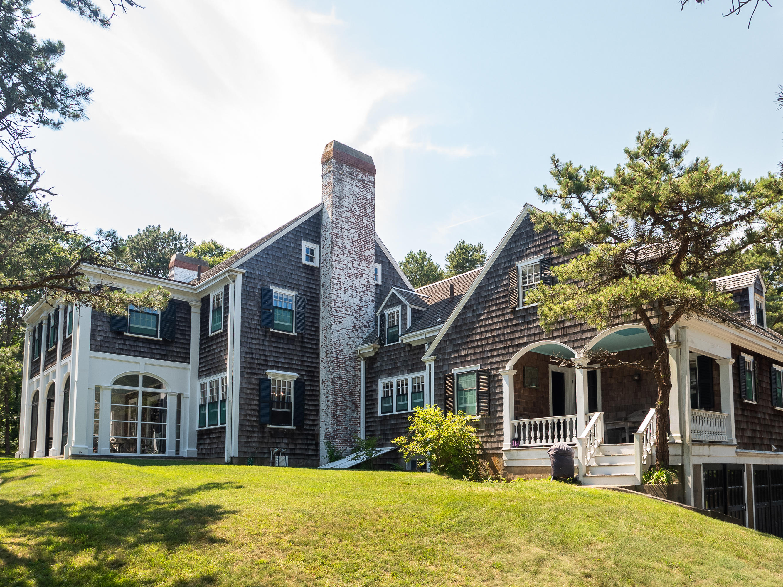 671 Old Post Road Cotuit, MA 02635 - Photo 26 of 36 a front view of building with yard