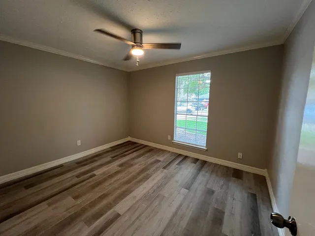 a view of an empty room and window