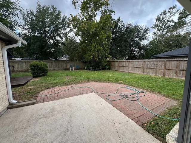 a view of a backyard with a garden