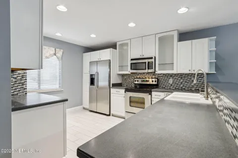 $395,000 | 14750 Beach Boulevard, Unit 34, Jacksonville, FL 32250