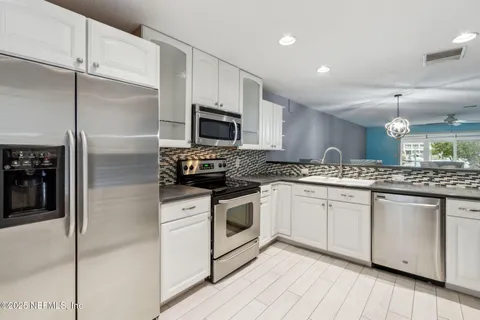 $395,000 | 14750 Beach Boulevard, Unit 34, Jacksonville, FL 32250