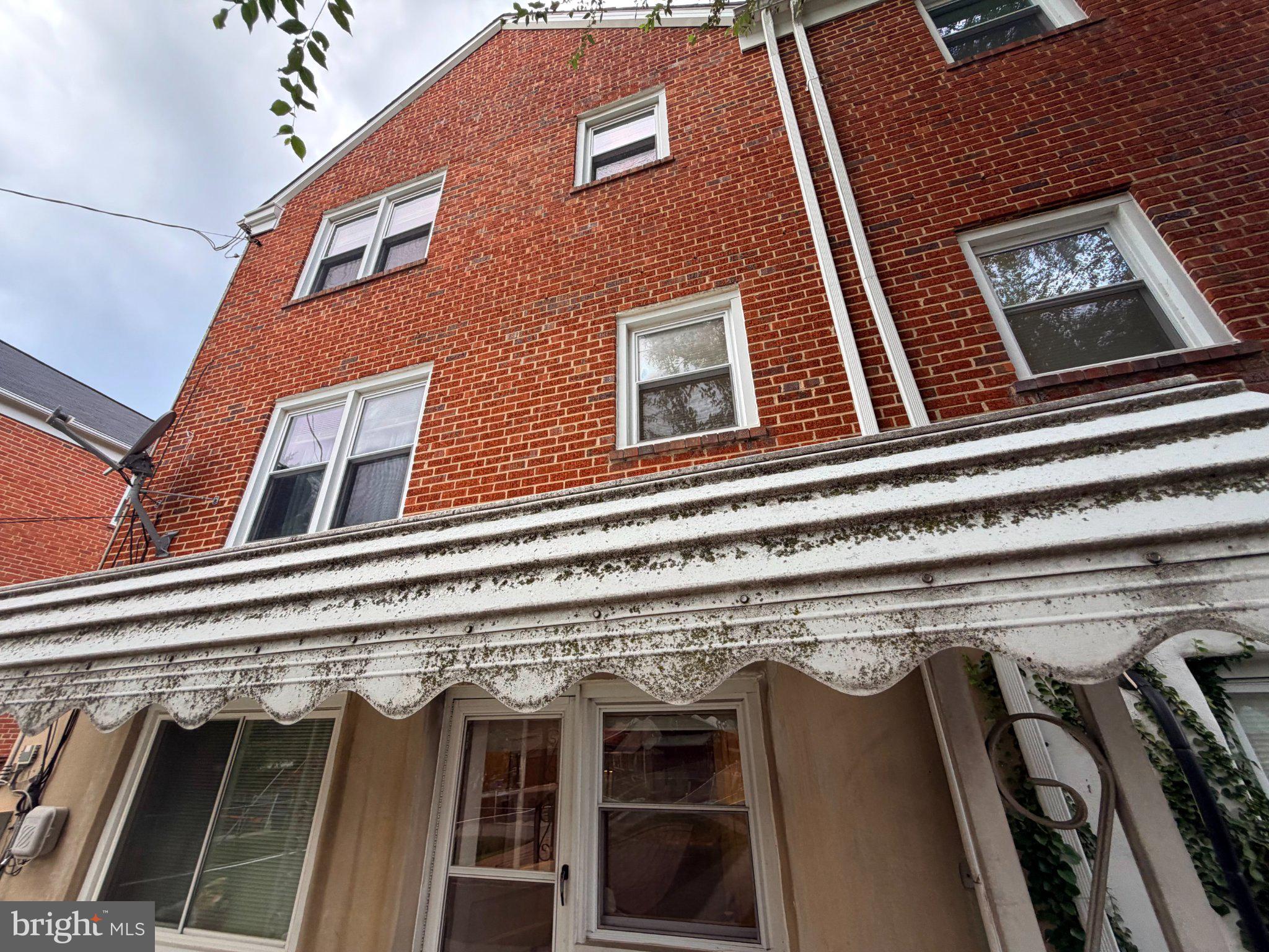 1615 Burnwood Road Baltimore, MD 21239 - Photo 70 of 83 Charming brick facade with awning.