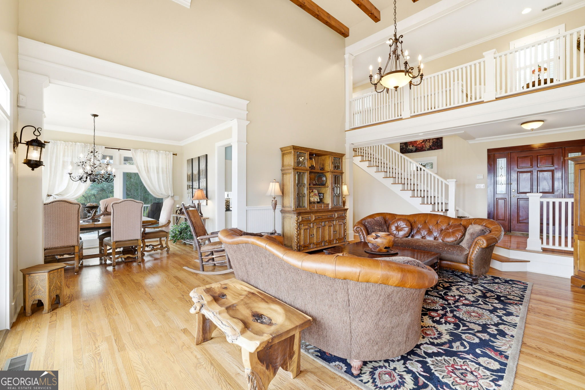 1171 Rabun Bluffs Drive Lakemont, GA 30552 - Photo 11 of 75 a living room with furniture and a chandelier