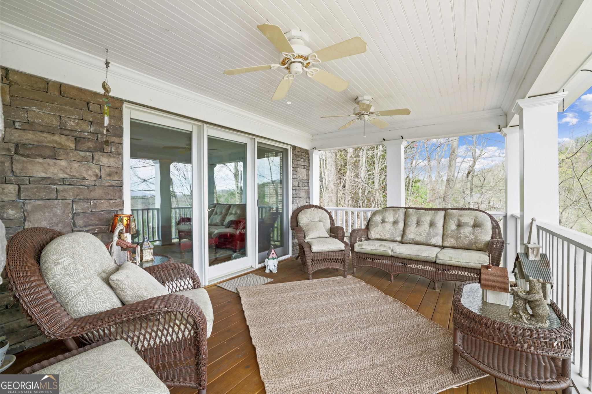 1171 Rabun Bluffs Drive Lakemont, GA 30552 - Photo 17 of 75 a living room with furniture and a large window