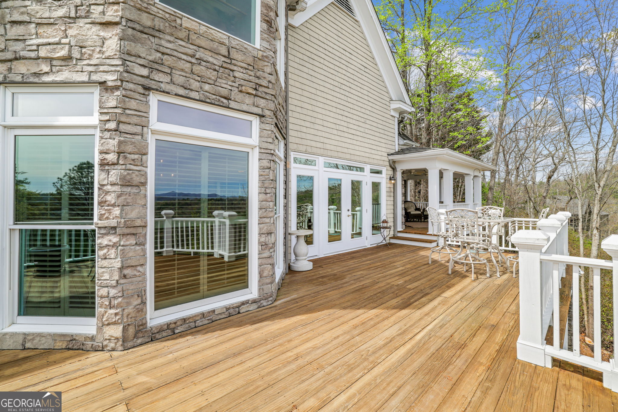 1171 Rabun Bluffs Drive Lakemont, GA 30552 - Photo 18 of 75 a view of a house with wooden floor and a large window