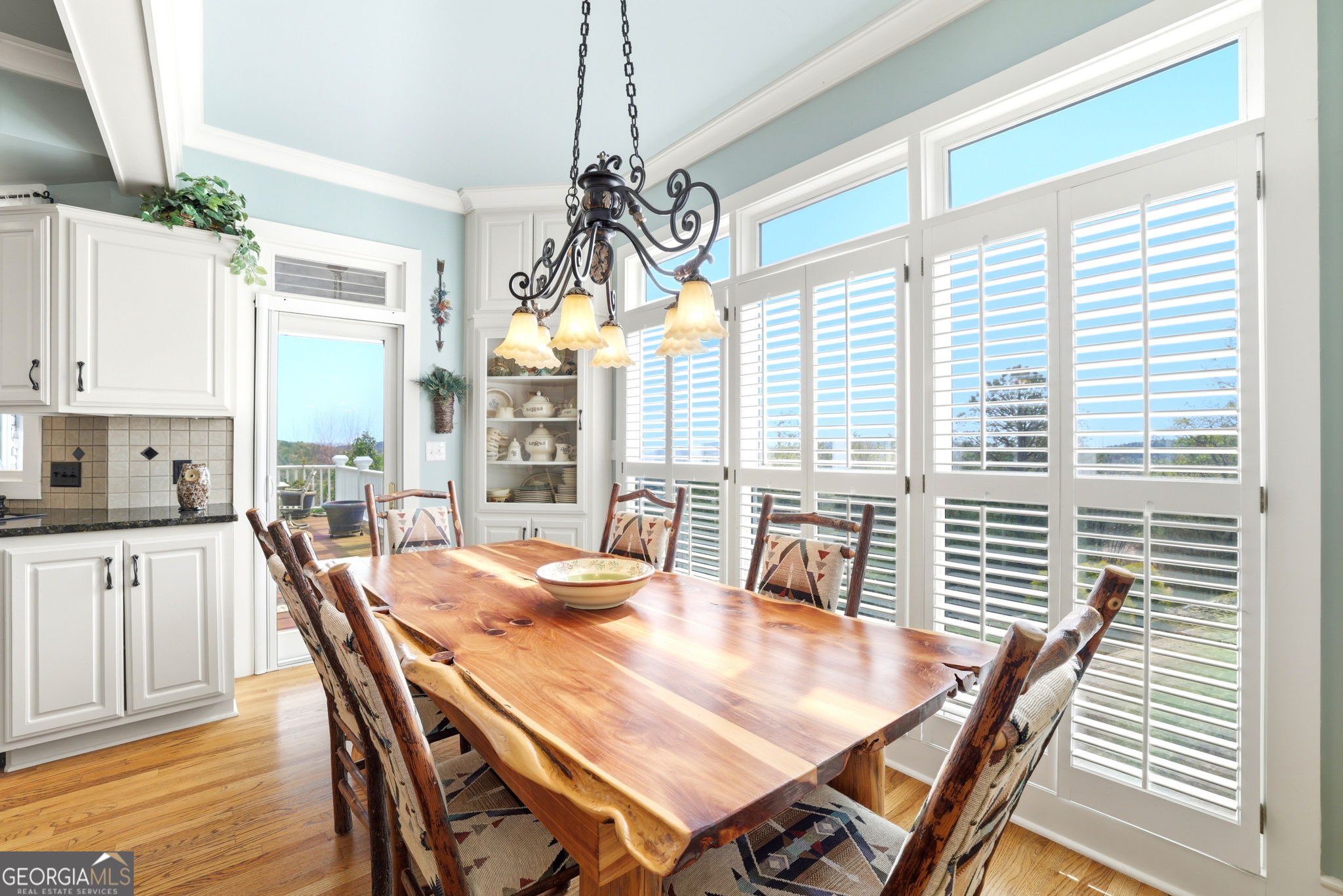 1171 Rabun Bluffs Drive Lakemont, GA 30552 - Photo 20 of 75 a view of a dining room with furniture window and wooden floor