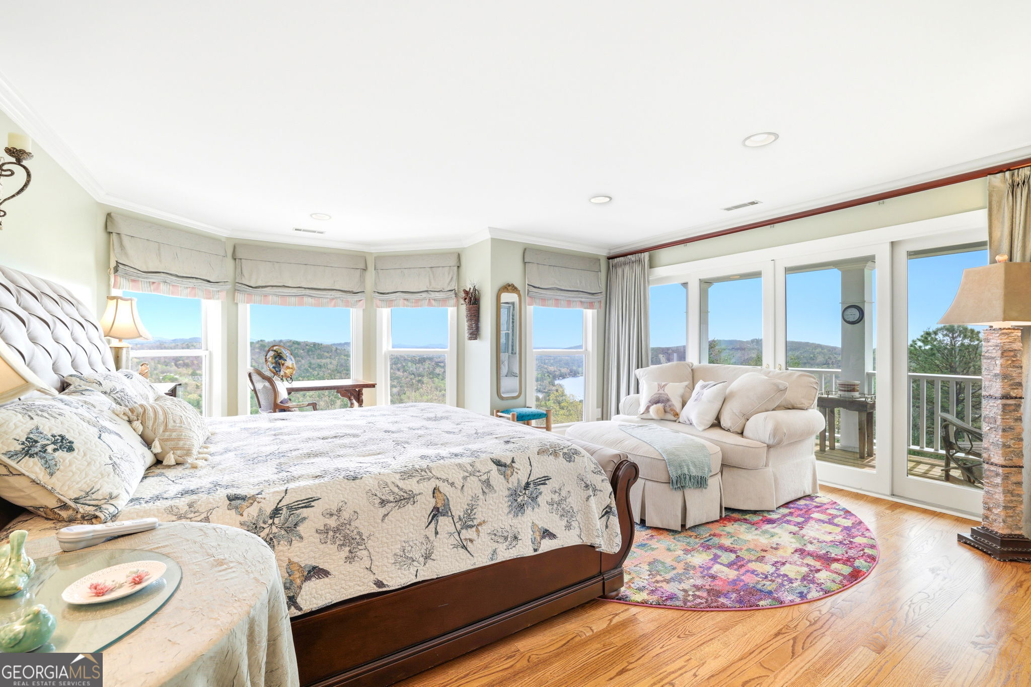 1171 Rabun Bluffs Drive Lakemont, GA 30552 - Photo 40 of 75 a bedroom with a bed and large windows