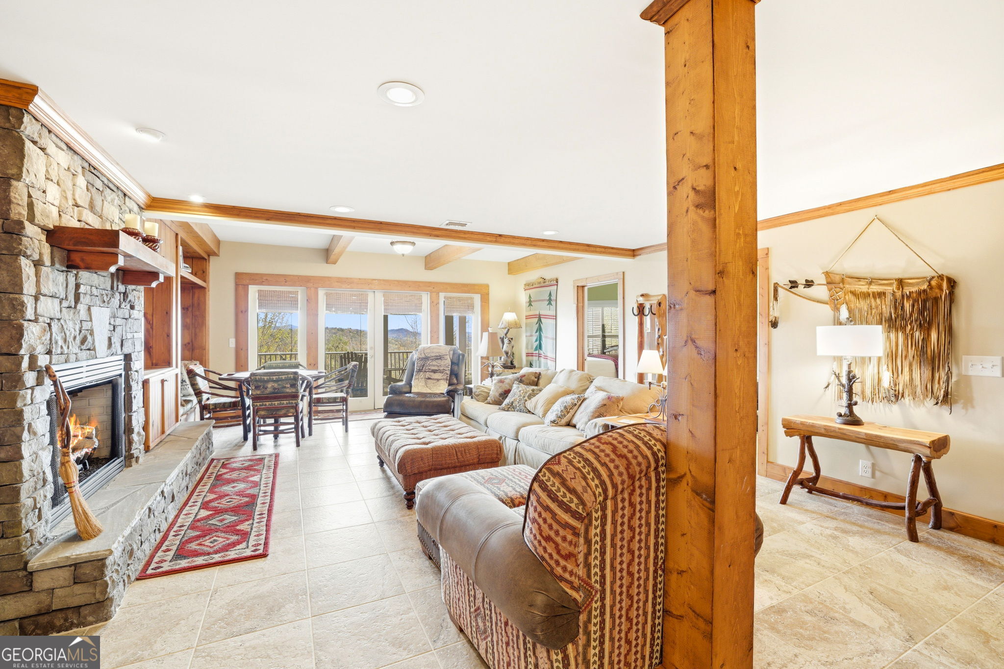 1171 Rabun Bluffs Drive Lakemont, GA 30552 - Photo 49 of 75 a living room with furniture and floor to ceiling windows