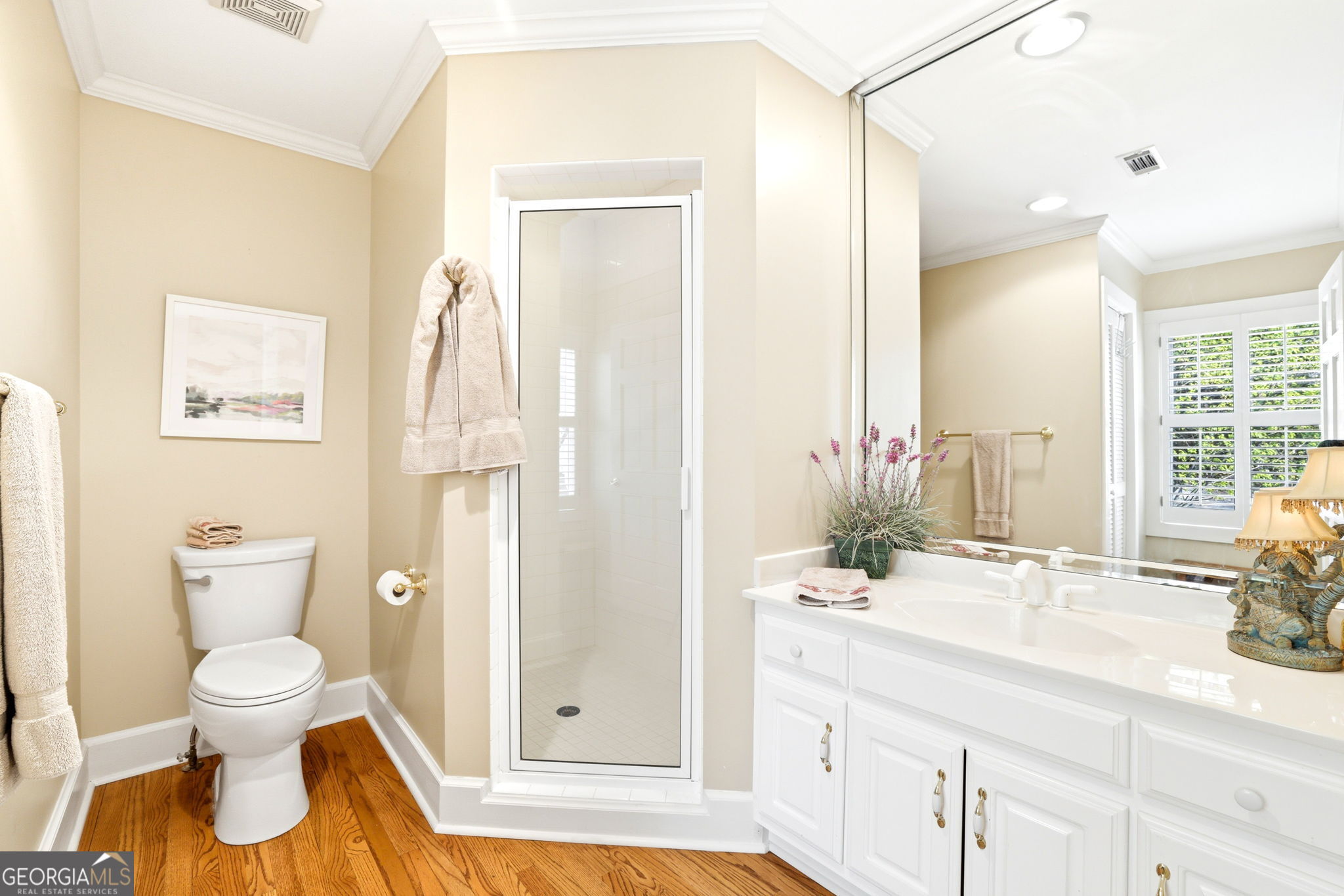 1171 Rabun Bluffs Drive Lakemont, GA 30552 - Photo 50 of 75 a bathroom with a granite countertop sink toilet and shower