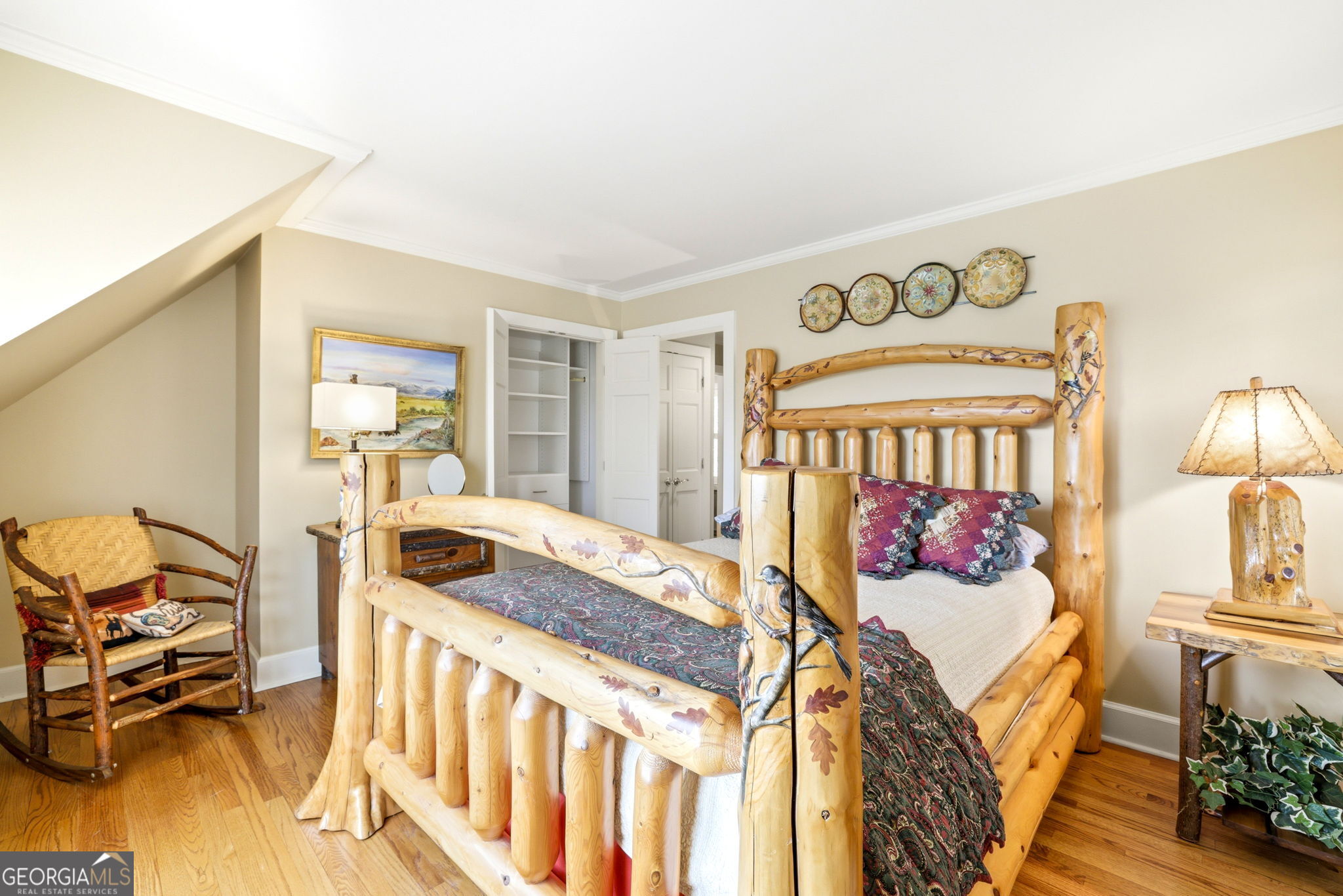 1171 Rabun Bluffs Drive Lakemont, GA 30552 - Photo 51 of 75 a bedroom with furniture and a wooden floor