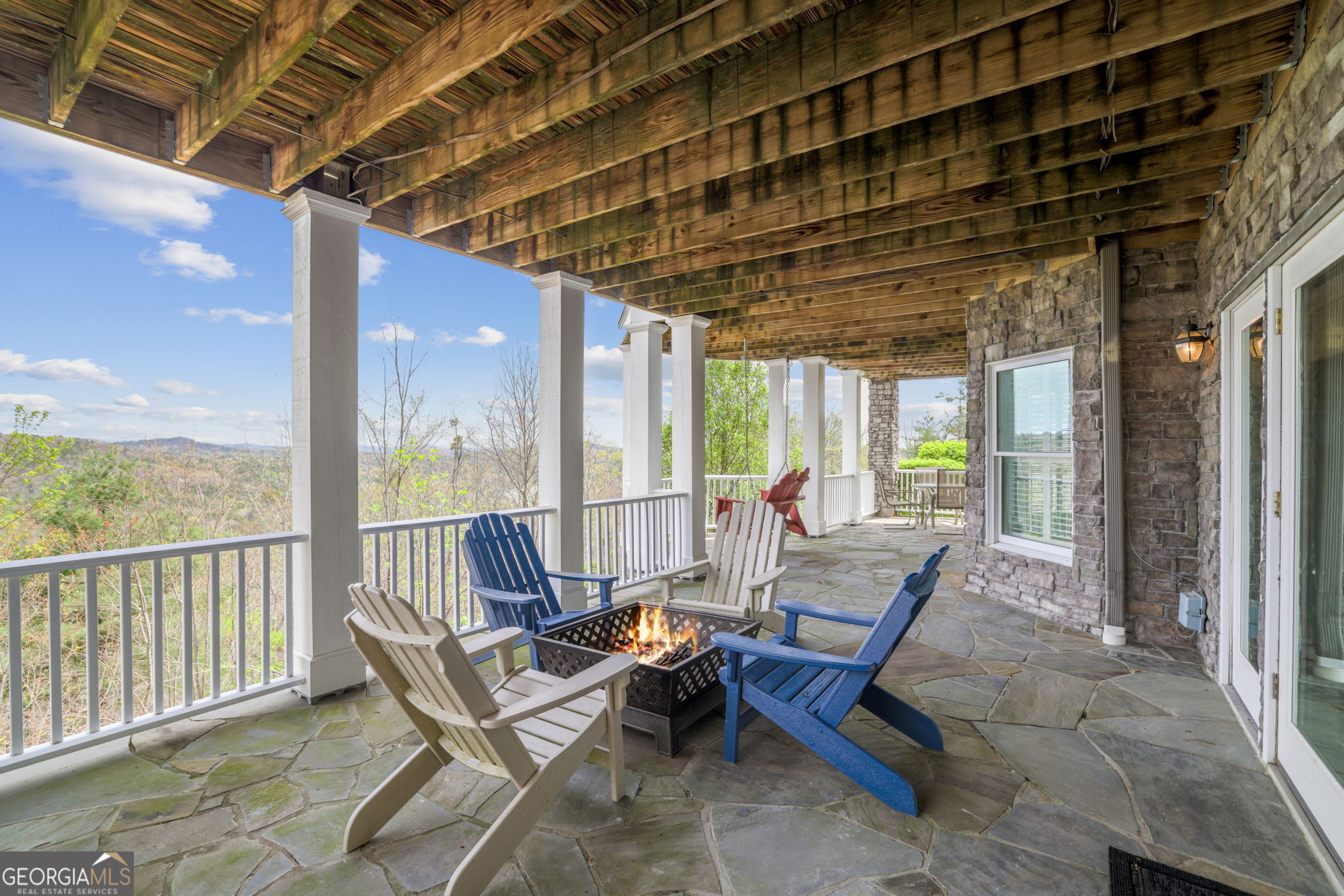 1171 Rabun Bluffs Drive Lakemont, GA 30552 - Photo 56 of 75 a building outdoor space with patio furniture and garden view